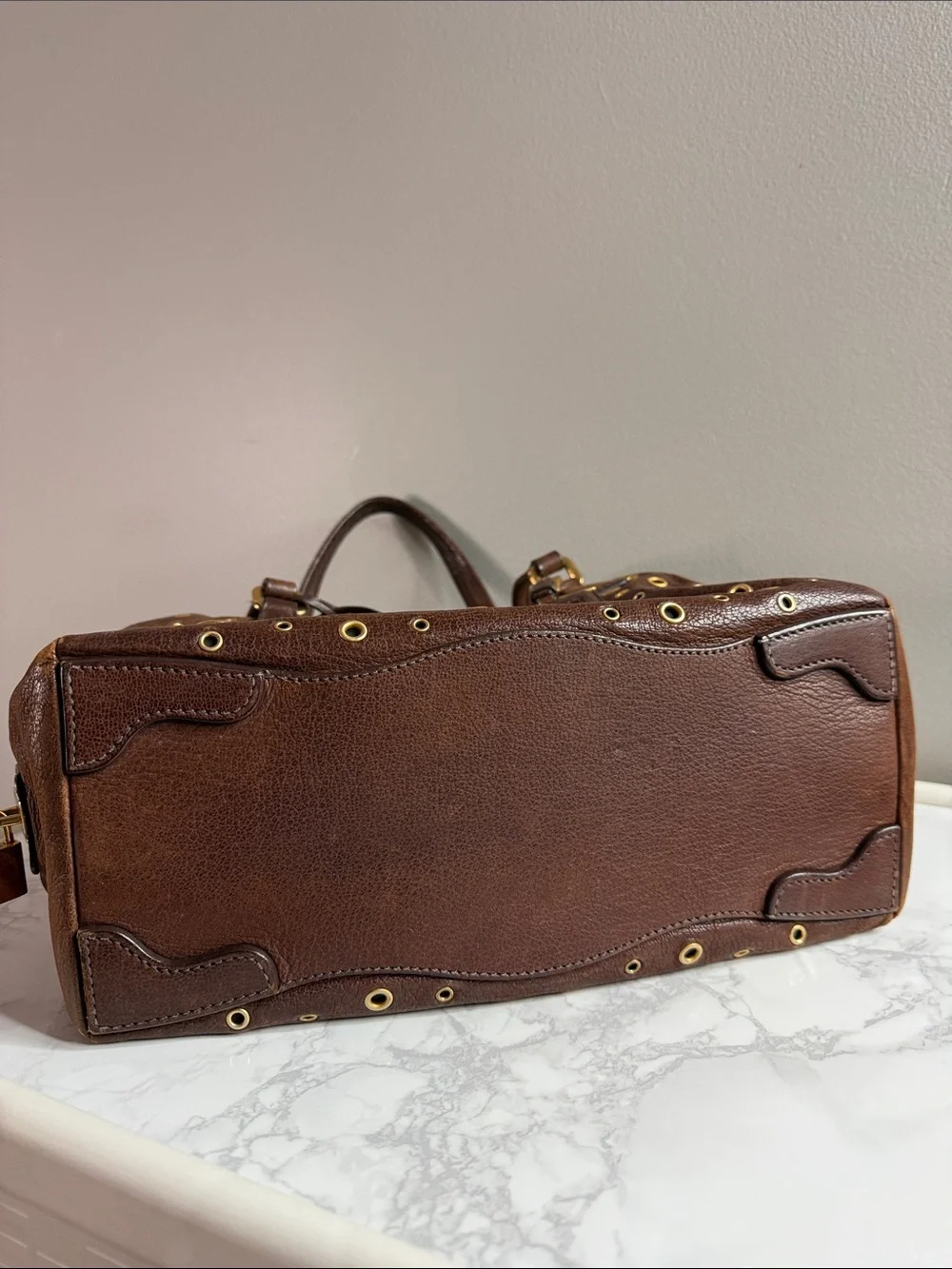 Prada Dark Brown Leather Grommet Satchel with Gold Hardware